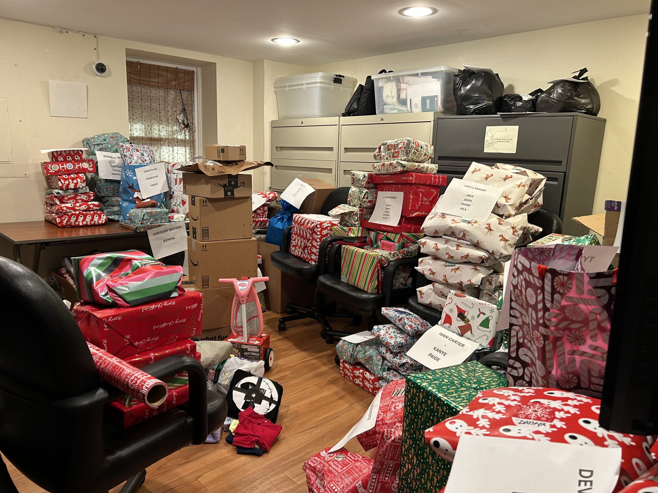 Office filled with holiday gifts for clients