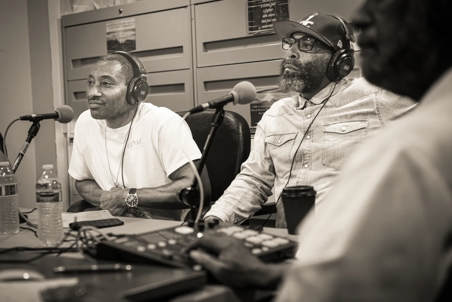 Podcast hosts Michael Dickerson El (left) Dietrich Trent (right) record an episode