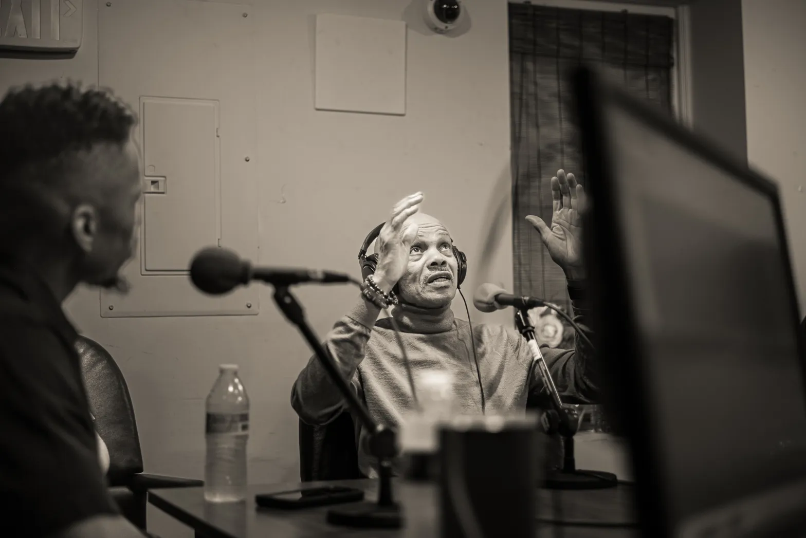 Podcast host Charles Hopkins (middle)